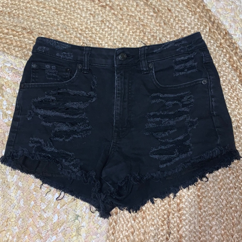 Black ripped shorts